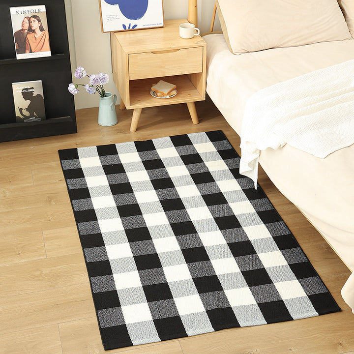 Modern flat-weave area rug with contrasting stripes and non-slip underside