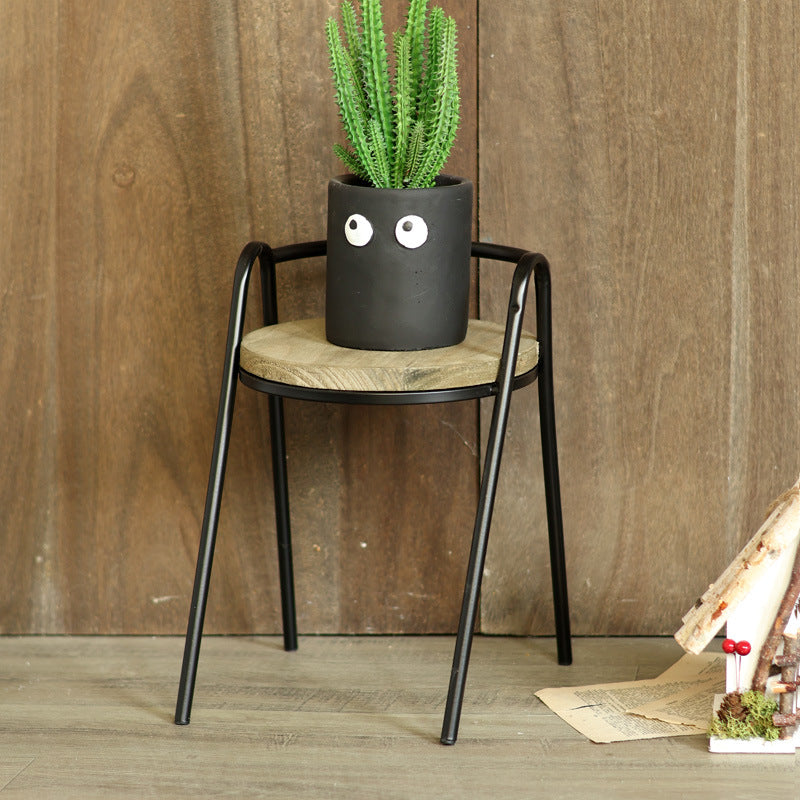 More modern stool with wooden seat