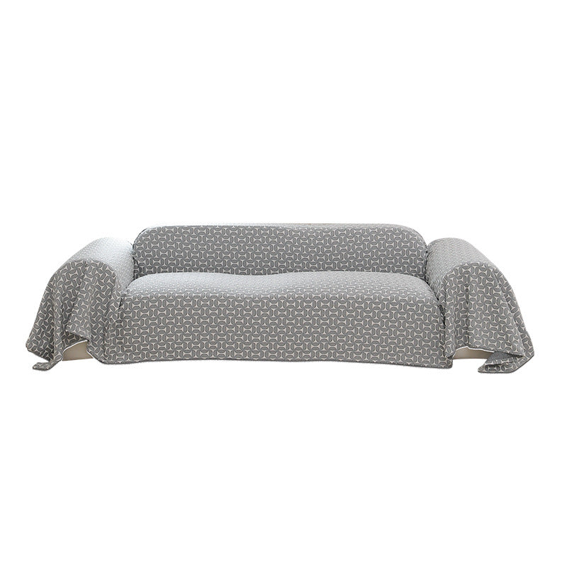 Washable sofa cover with geometric jacquard pattern and non-slip underside