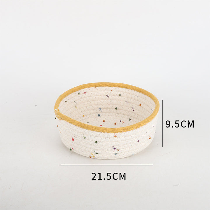 Storage basket made of natural cotton fabric with colorful dots