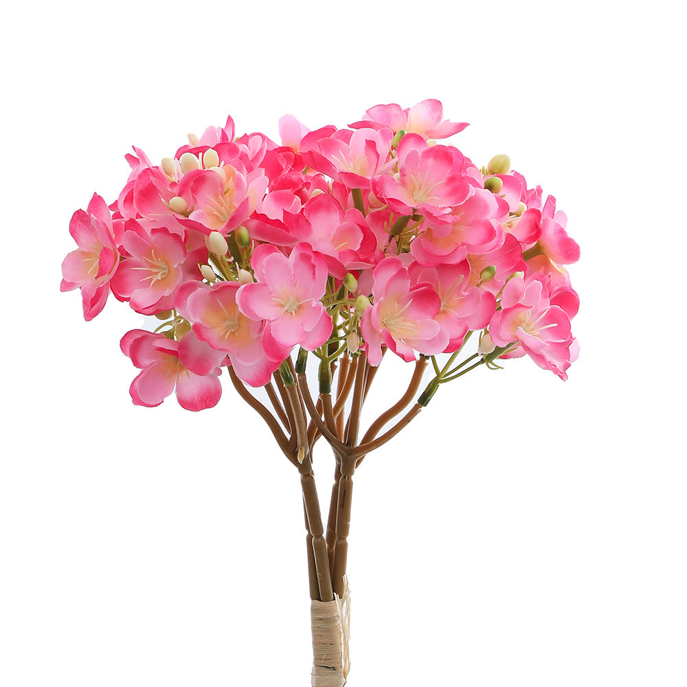 Artificial flower bouquet with delicate blooms