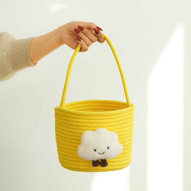 Storage basket with playful cloud motif