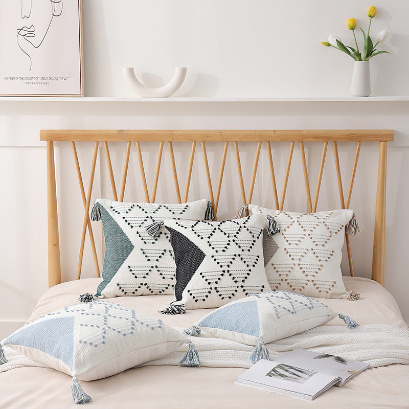 Woven decorative cushion cover with geometric tuft pattern, tassels and concealed zipper