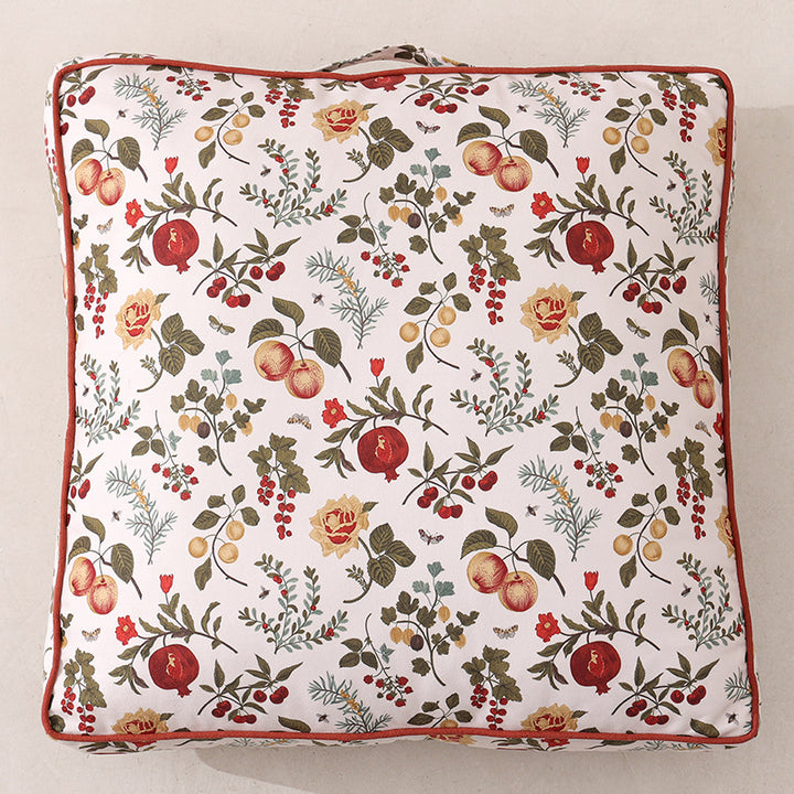 Large square floor cushion with floral cotton cover, piping, and carrying handle