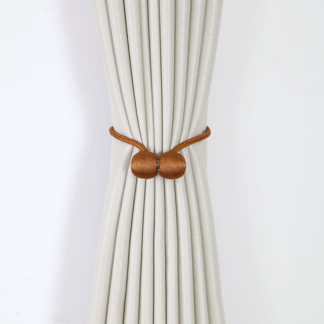 Decorative curtain tieback