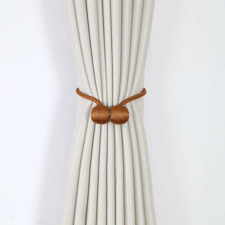Decorative curtain tieback