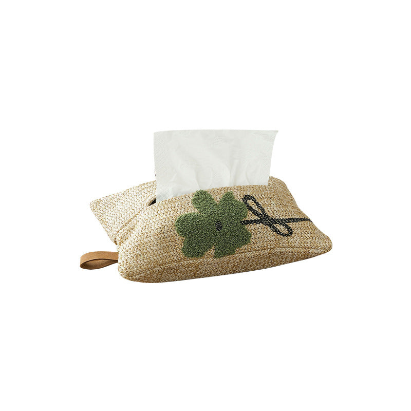 Woven tissue box cover in straw look with embroidered flower motif