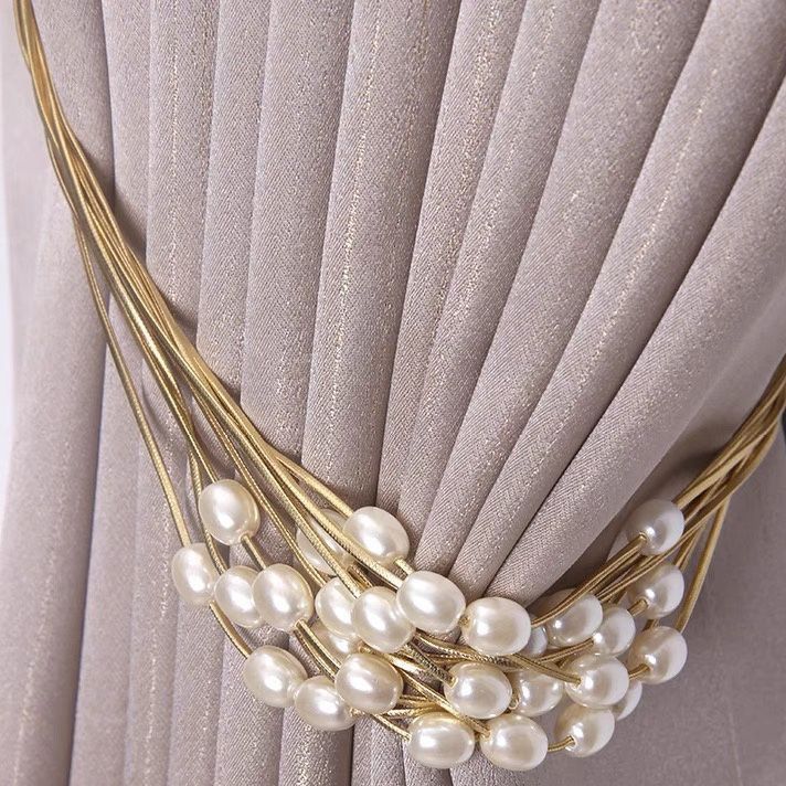 Decorative curtain holder with bead accent