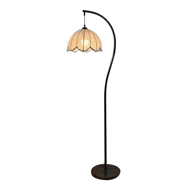 Stylish arc floor lamp with integrated side table