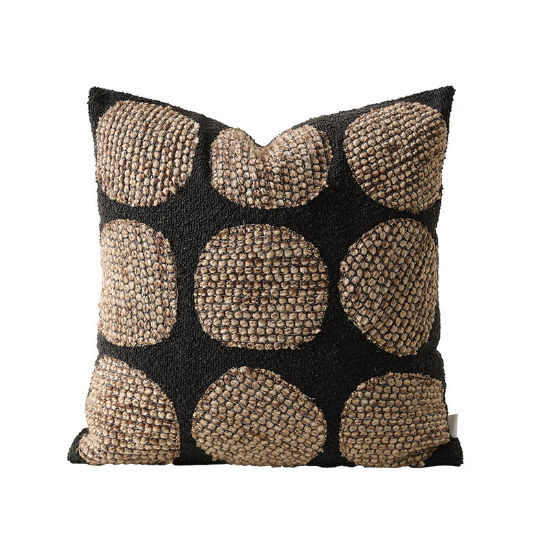 Square woven decorative cushion with structured bouclé appliqué and natural fiber relief
