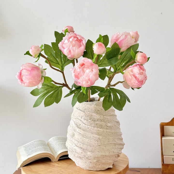 Artificial peony bouquet with delicate flowers and leaves