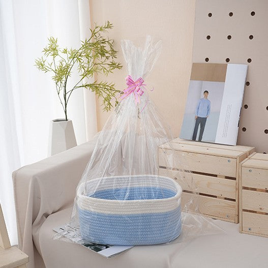 Natural storage basket with ribbons