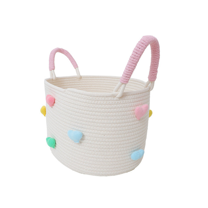 Playful storage basket with heart pattern
