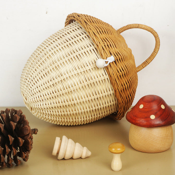 Playful storage basket in acorn design