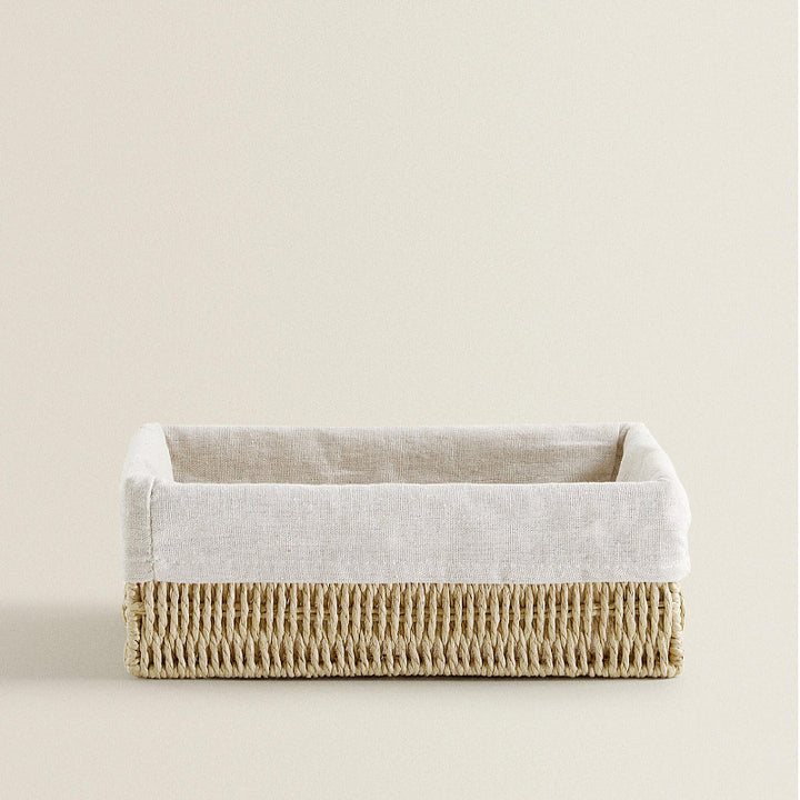 Natural storage basket with removable lining