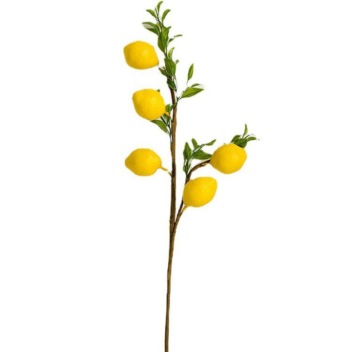 Decorative branch with artificial lemons