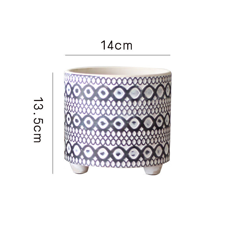 Decorative plant pot with geometric pattern