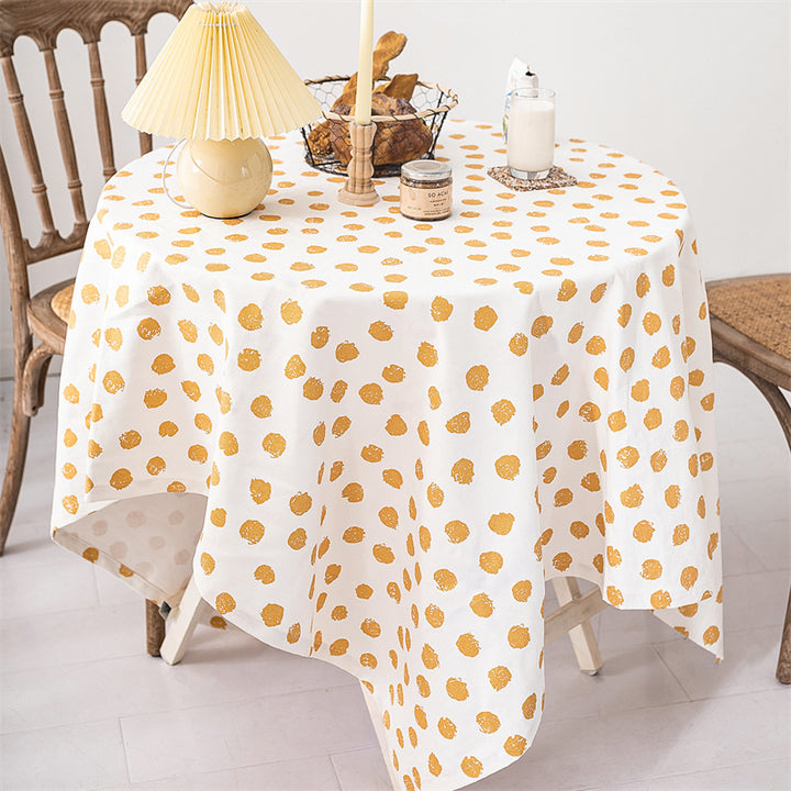 Rectangular tablecloth made of cotton-linen blend with embossed polka dot pattern and water-repellent surface