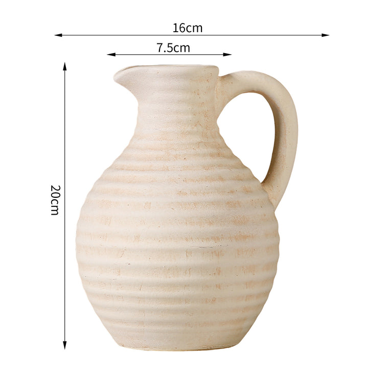 Handcrafted ceramic vase with ribbed structure