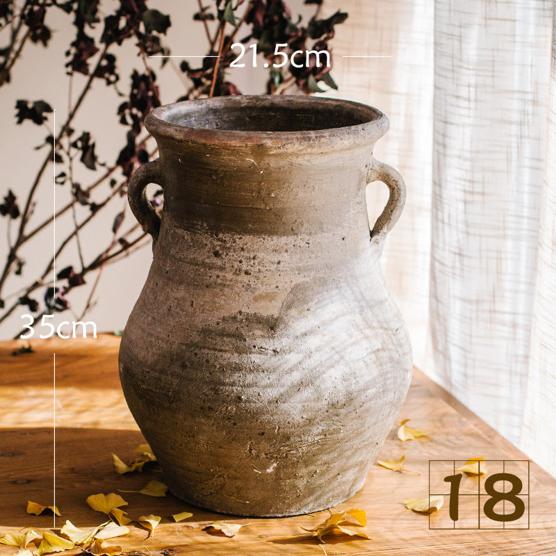 Rustic ceramic pot with handmade design
