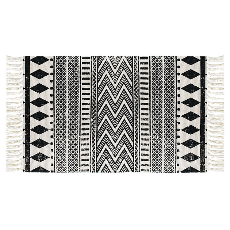 Flat-woven cotton runner with Mediterranean tile jacquard and decorative fringes