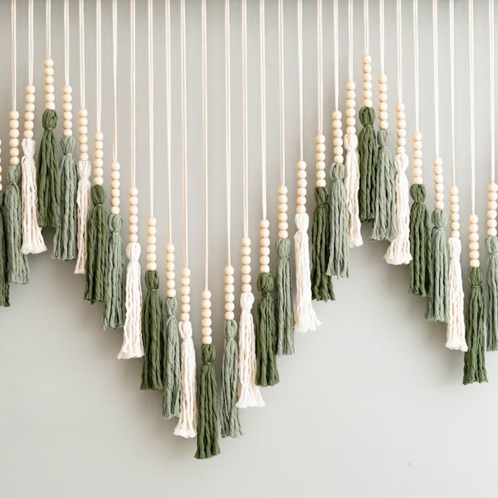Artful macramé wall hanging with gradient and elegant tassels