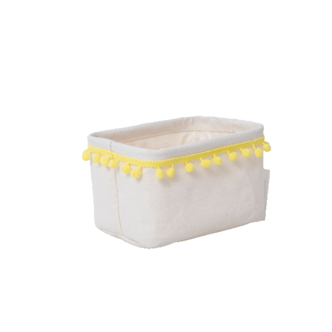 Storage basket with decorative pom-pom trim