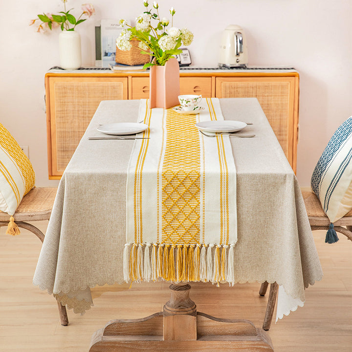 Handwoven cotton table runner with ethnic diamond pattern and fringes