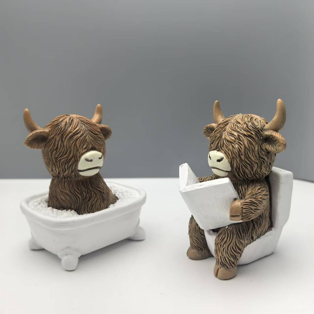Funny decorative figure of a Highland cow in a bathtub