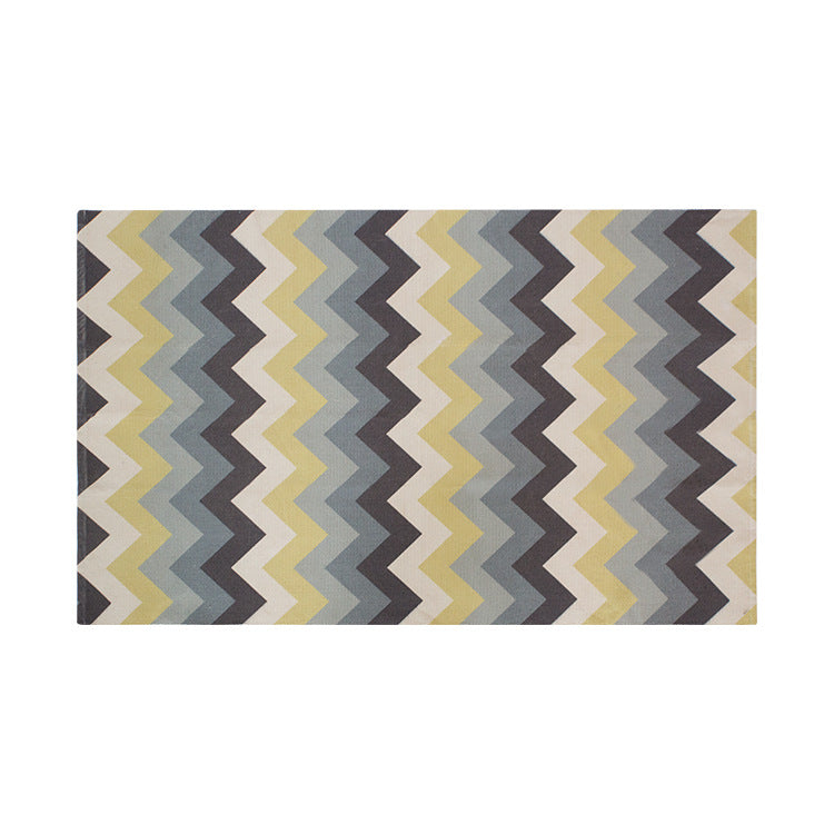 Flat-woven rectangular rug for living and entrance areas with quatrefoil pattern