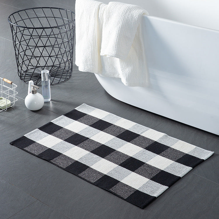 Striped cotton doormat with non-slip bottom and decorative woven edge
