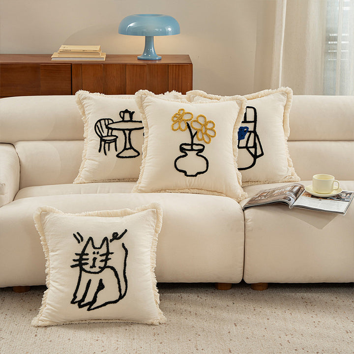 Decorative pillowcase with embroidered café motif, fringed edge, and concealed zipper