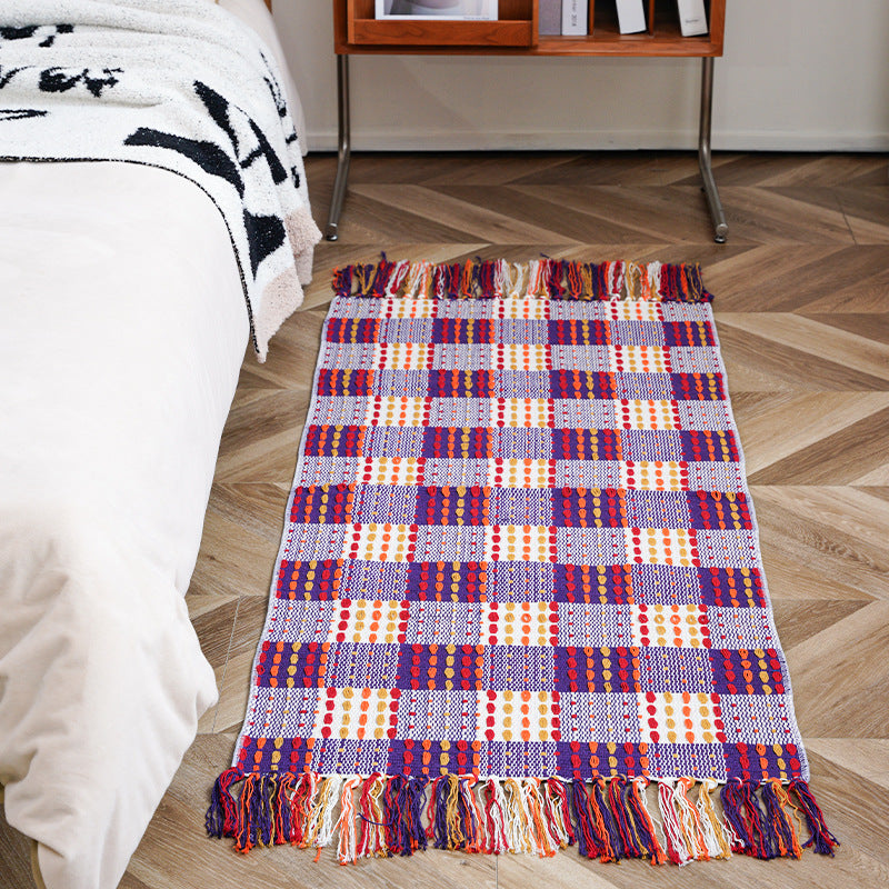 Flat-woven runner rug with check pattern and decorative border stripe