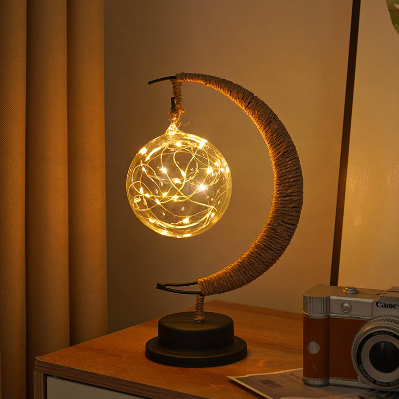Decorative glass apple LED table lamp with moon-shaped rope-wrapped stand