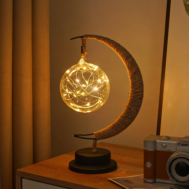 Decorative glass apple LED table lamp with moon-shaped rope-wrapped stand