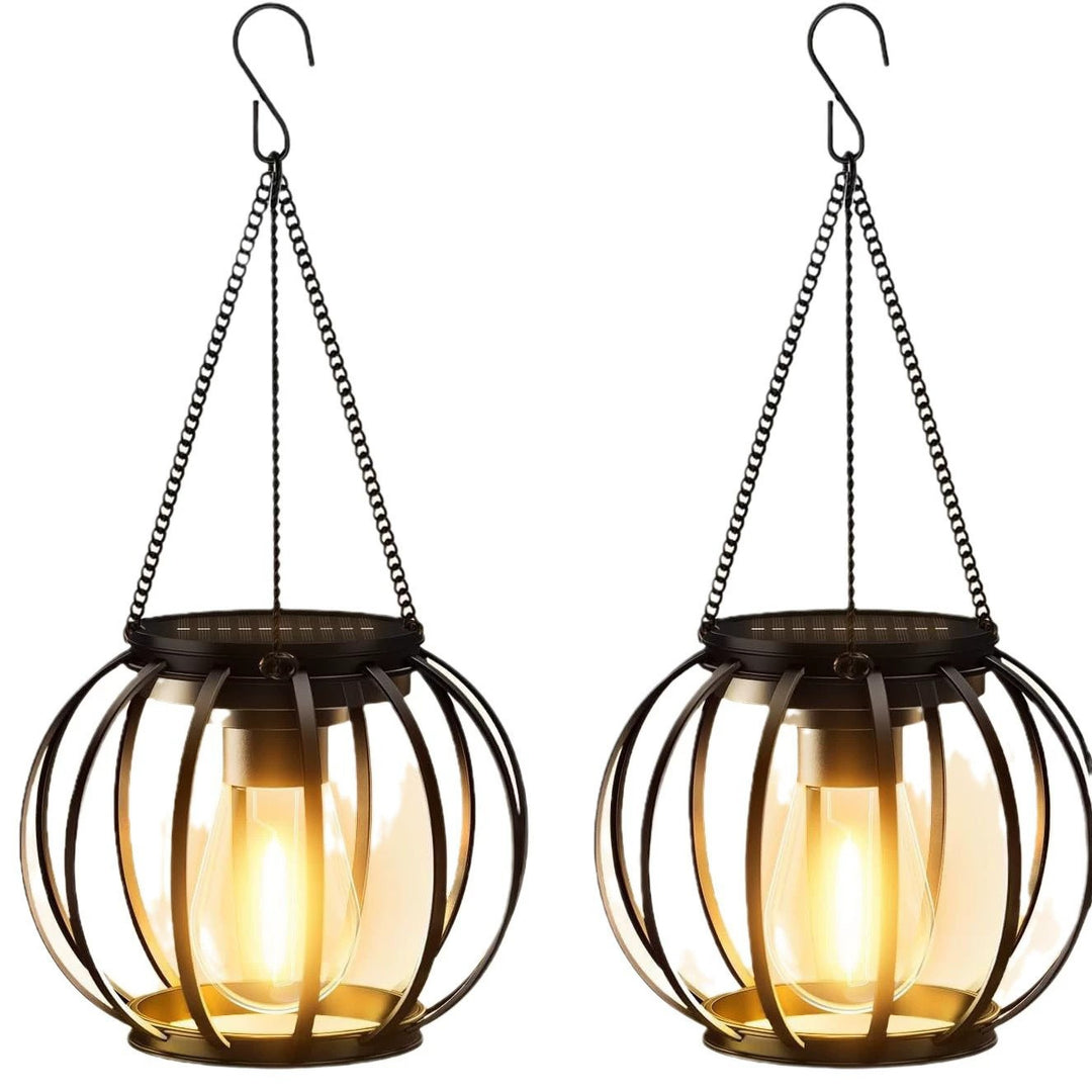 Weatherproof hanging solar LED lanterns for outdoor use with metal cage, warm glass, and hanging chain