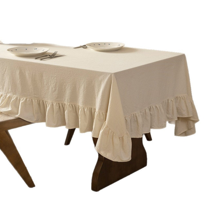 Rectangular decorative tablecloth with gathered flounce and light linen look
