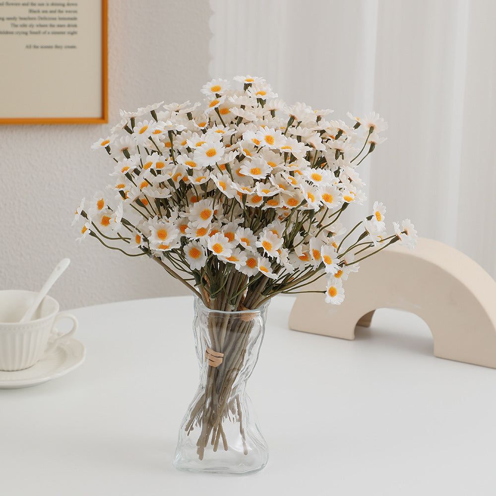Decorative artificial flower arrangement