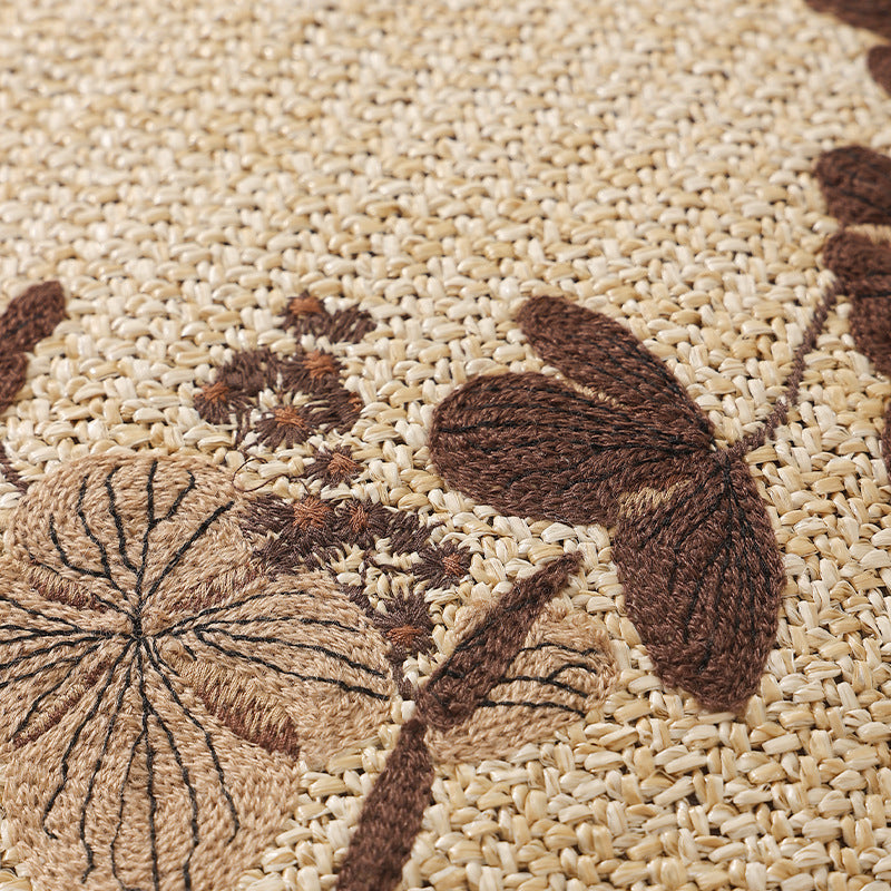 Round floor pouf seating with embroidered floral border