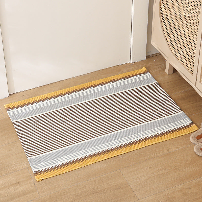Striped cotton doormat with non-slip bottom and decorative woven edge