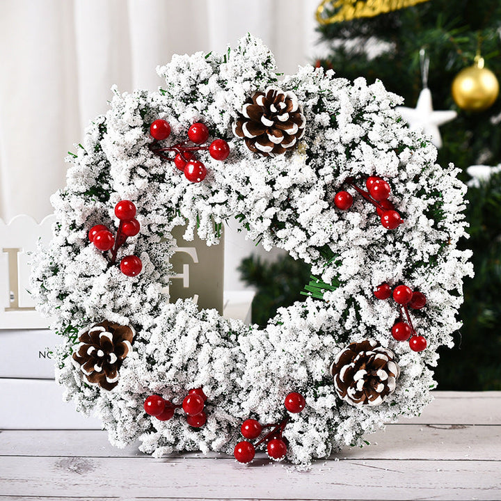 Festive Christmas wreath with pine cones and berries