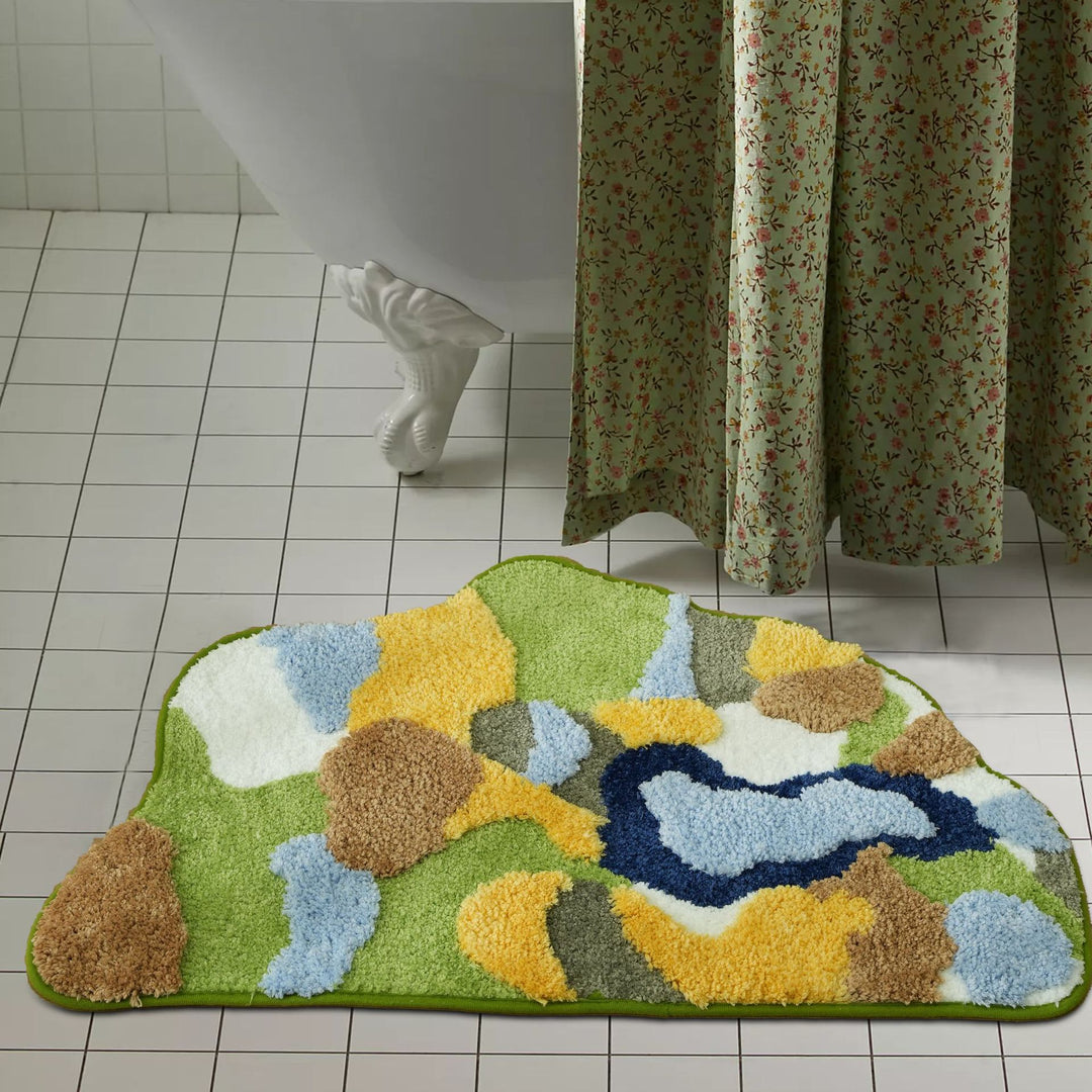 High-pile bathroom rug in organic shape with abstract textured pile
