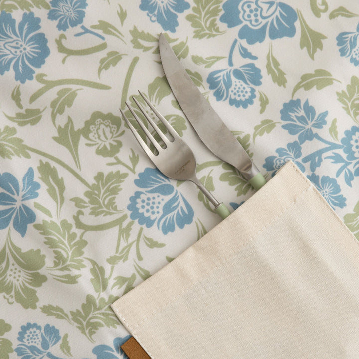 Cotton apron with floral pattern, adjustable neck strap and front pocket