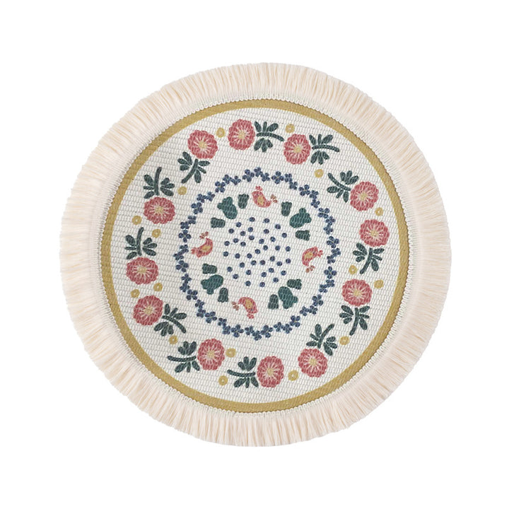 Round flat-woven cotton rug with mandala design and decorative fringes