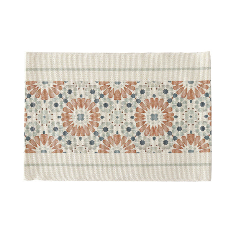Woven placemat made of cotton blend with geometric diamond trim and fine texture
