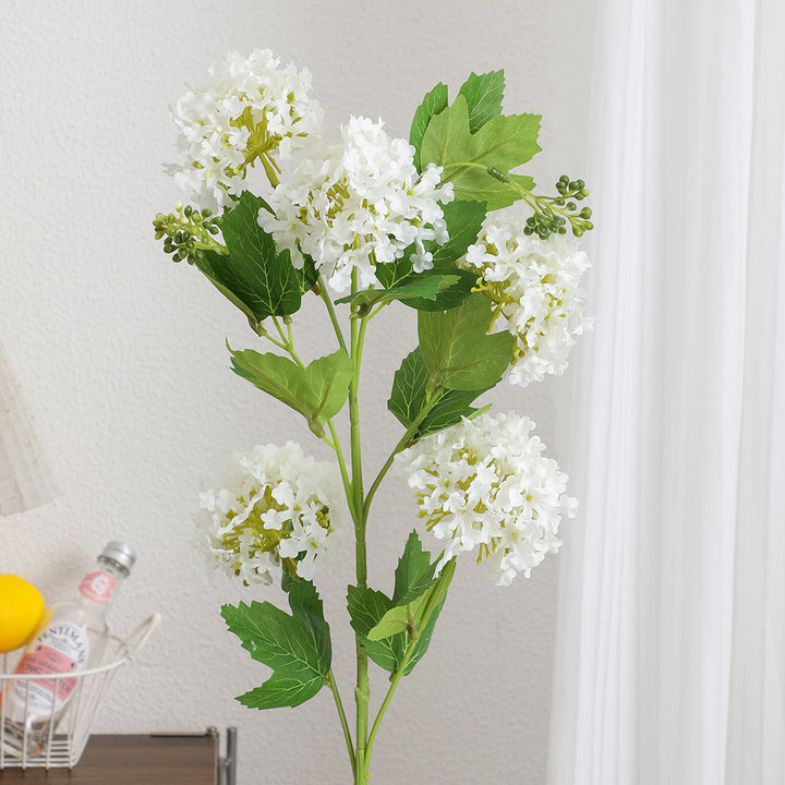 Artificial hydrangea branch with vibrant flowers and detailed leaves