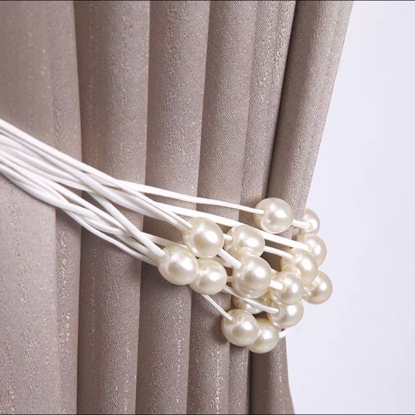 Decorative curtain holder with bead accent