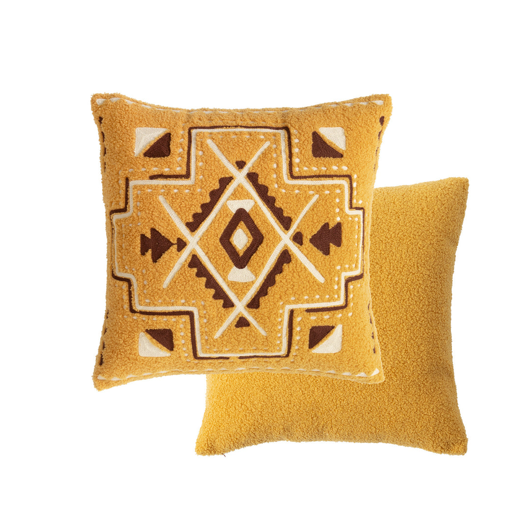 Bouclé pillow with hand-stitched ethnic design and removable cover