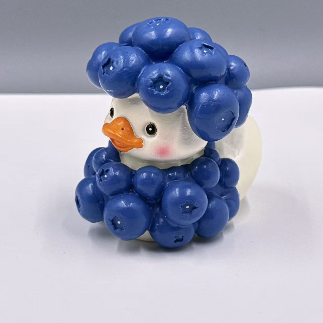 Decorative rubber duck with berry cocktail bowl