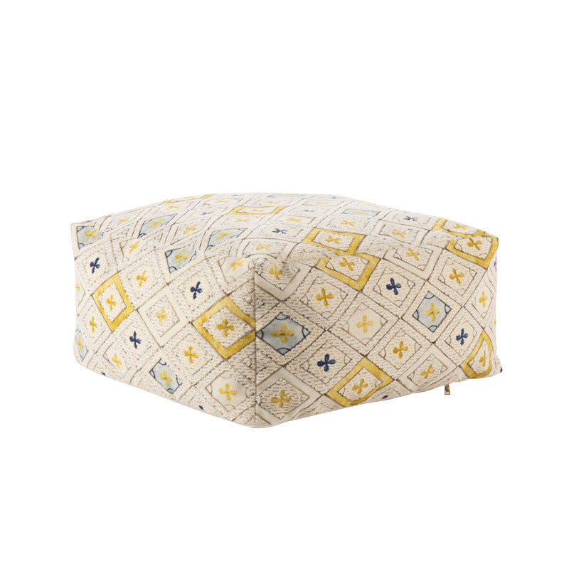 Seating pouf made of woven cotton blend with quilted diamond relief